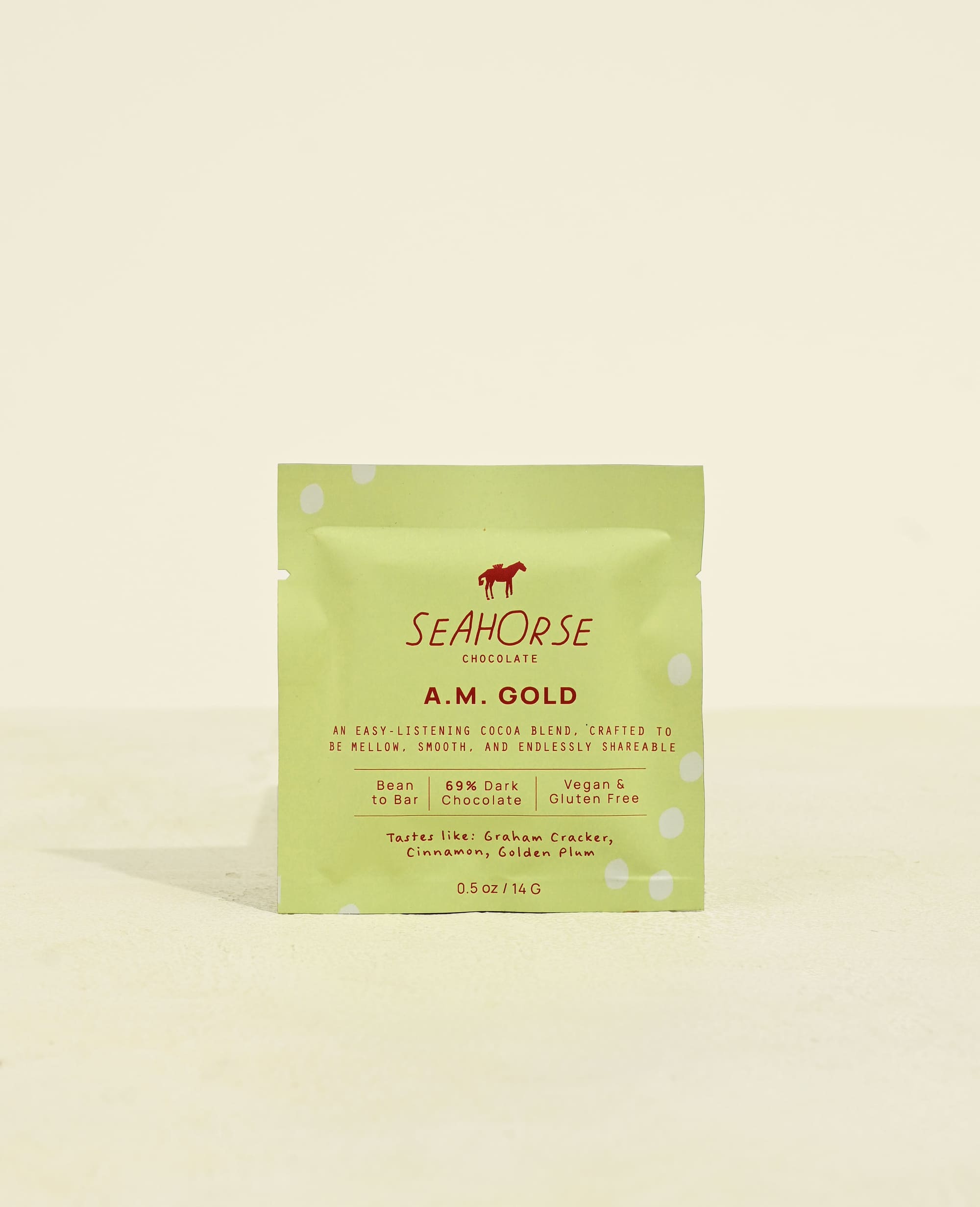 Seahorse A.M. Gold chocolate bar packaging on a light beige background