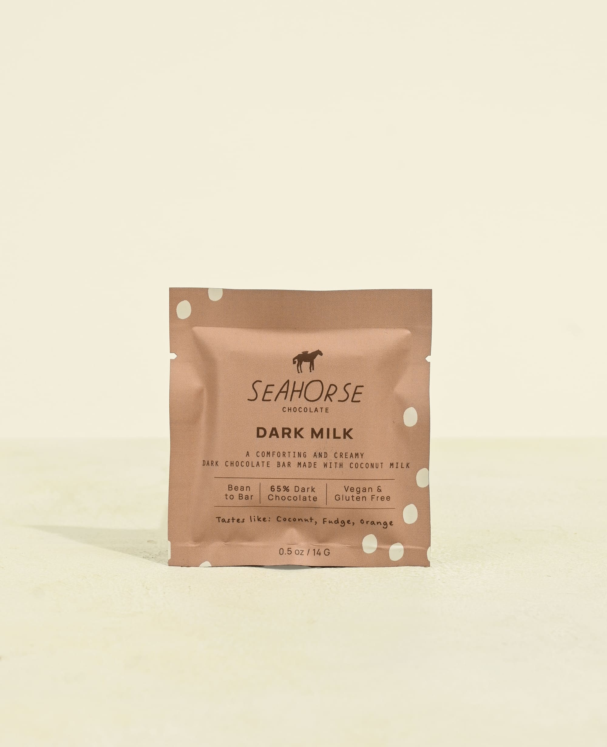 Seahorse Chocolate dark milk chocolate bar packaging on a beige background