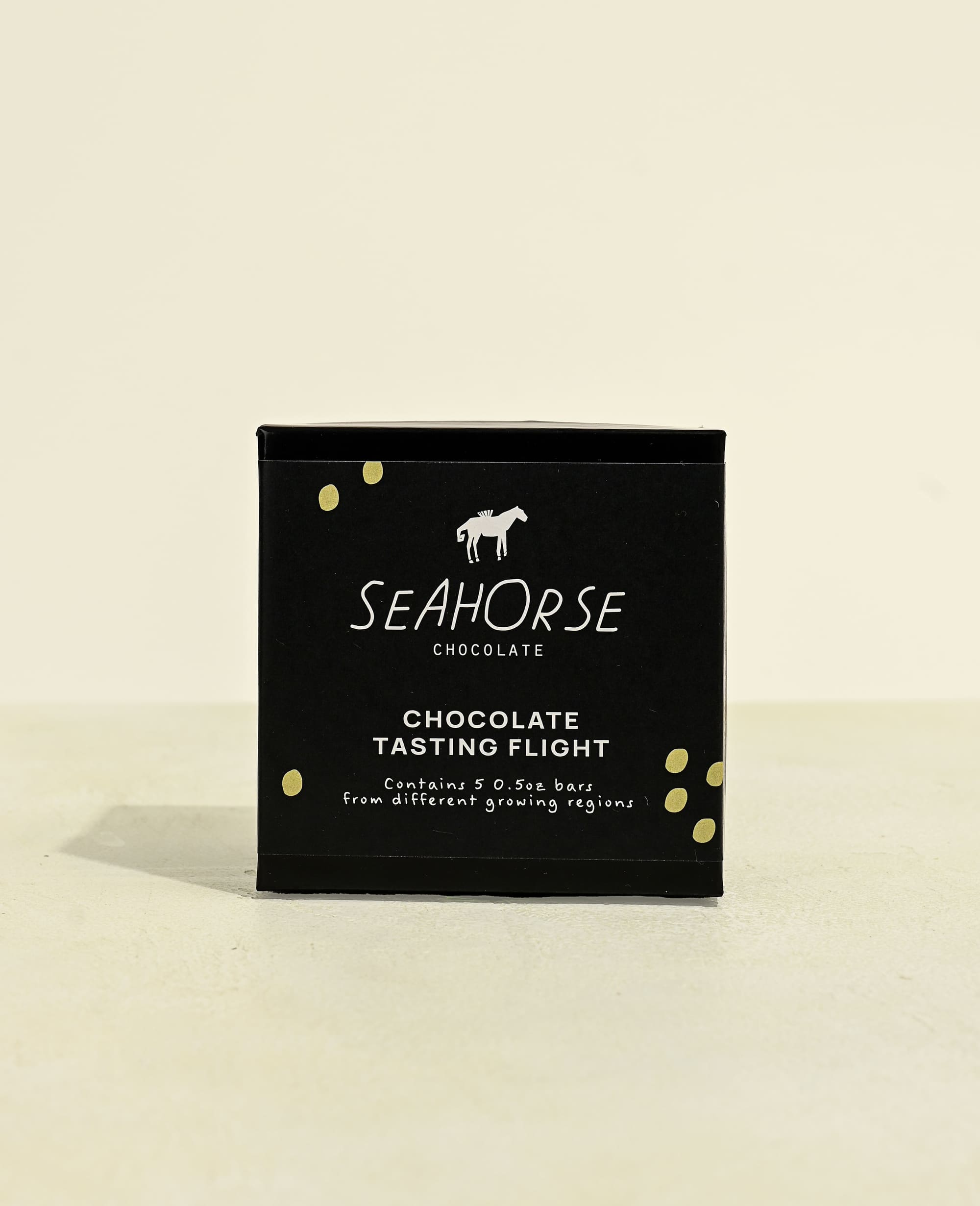 Seahorse Chocolate tasting flight chocolate sampler on a beige background