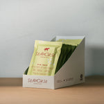 Box of Seahorse chocolate with a single package on a neutral background