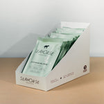 Box of Seahorse chocolate bars on a beige surface with a white background